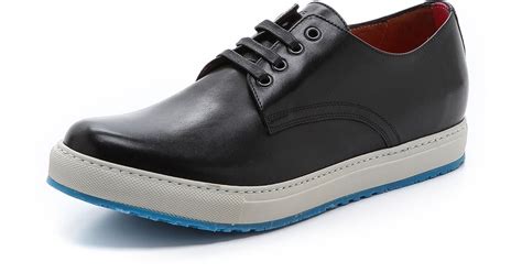 white sole black shoes